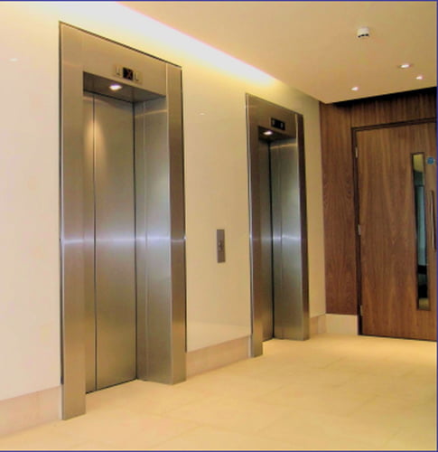 Tấm inox trắng gương dùng trang trí thang máy